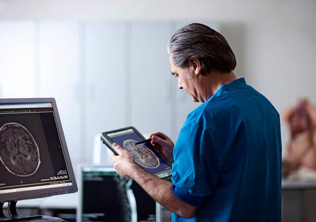 Person looking at data on a tablet