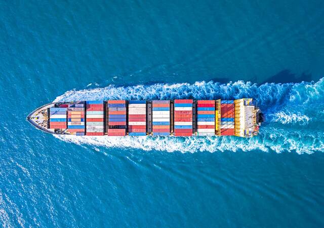 Aerial view of a container ship at sea