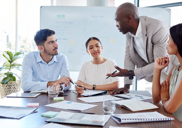 A group of colleagues collaborating in a meeting