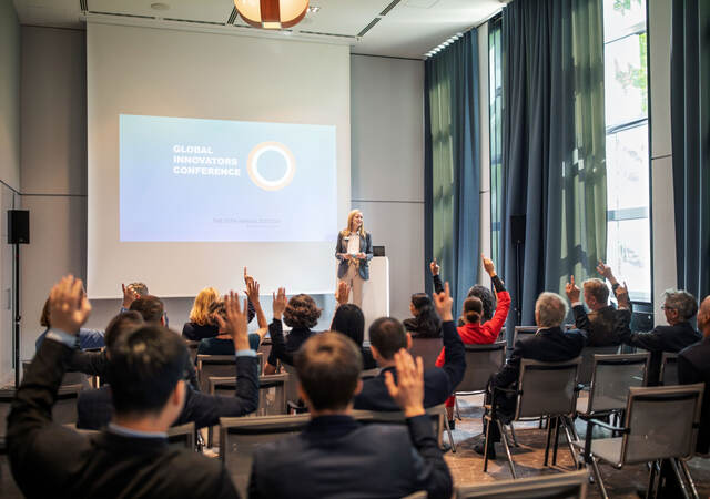 Group of people attending a presentation