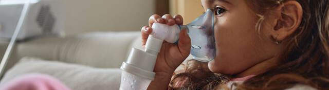 Child using a nebulizer