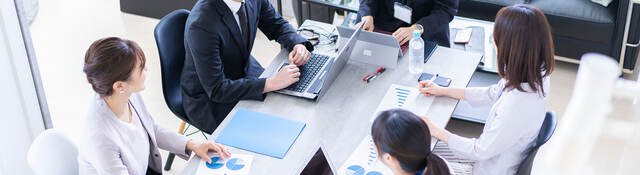 Group of colleagues having a meeting in a contemporary office setting