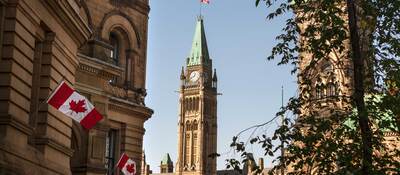 Canadian flags flying at Parliament Hill in Ottawa, Canada