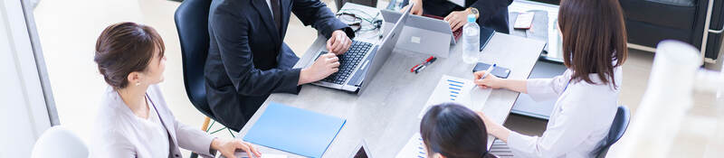 Group of colleagues having a meeting in a contemporary office setting