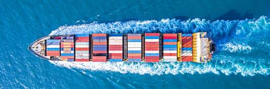 Aerial view of a container ship at sea