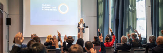 Group of people attending a presentation