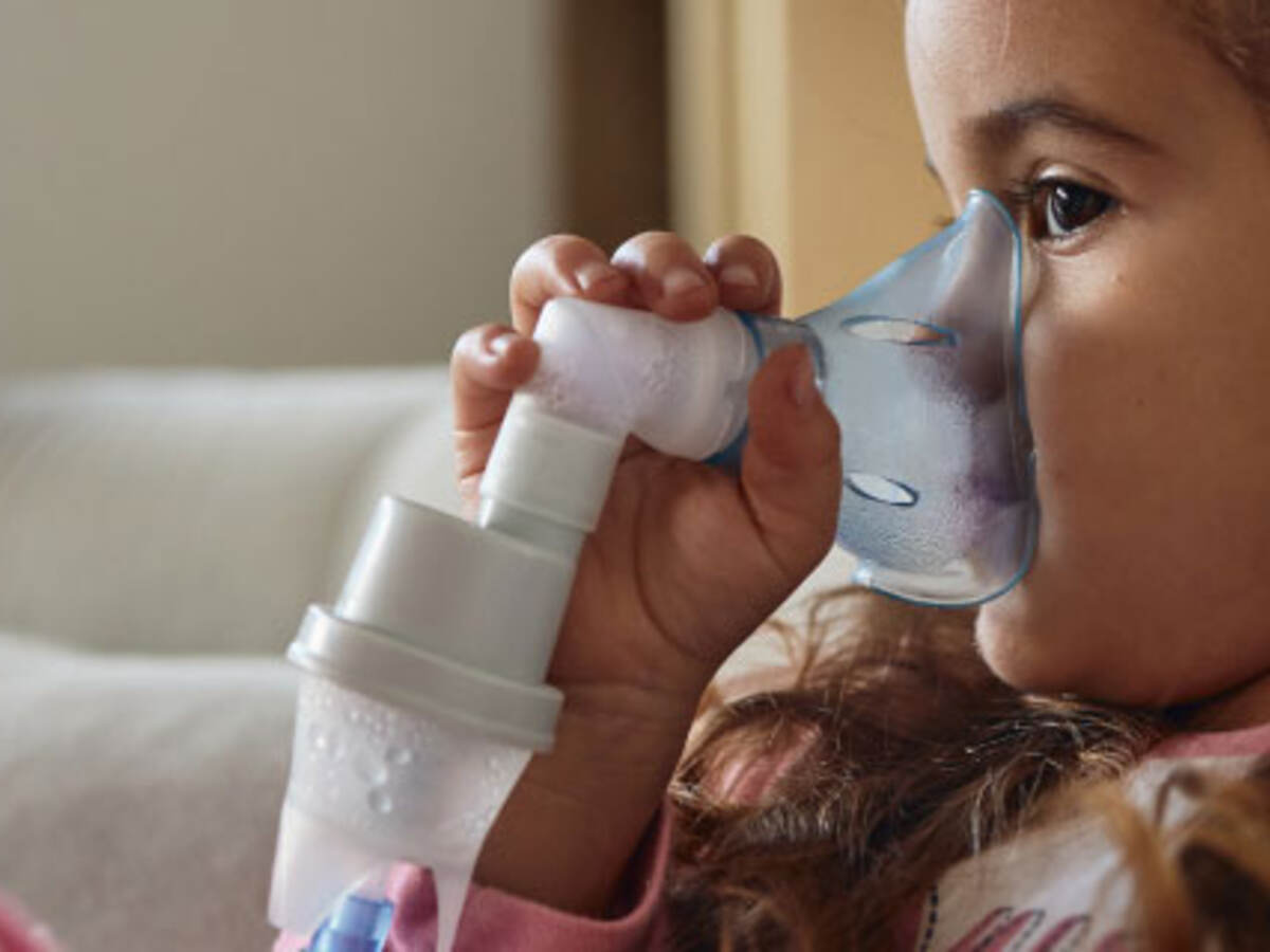 Child using a nebulizer