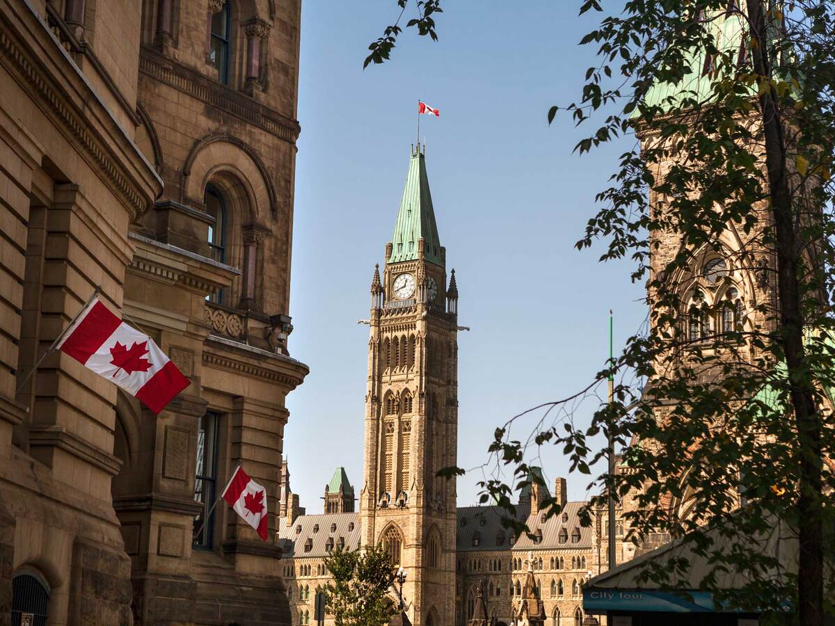 Canadian flags flying at Parliament Hill in Ottawa, Canada